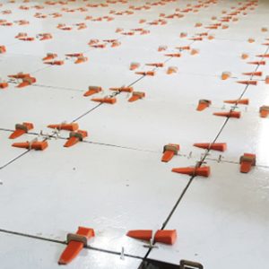 Implementing a tile leveling system